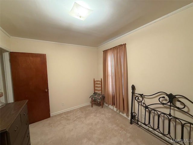 interior space featuring light carpet, baseboards, and ornamental molding