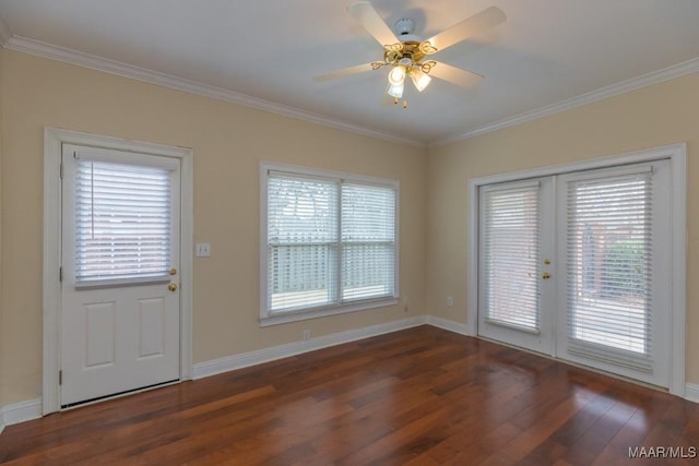 entryway featuring ornamental molding, french doors, baseboards, and wood finished floors