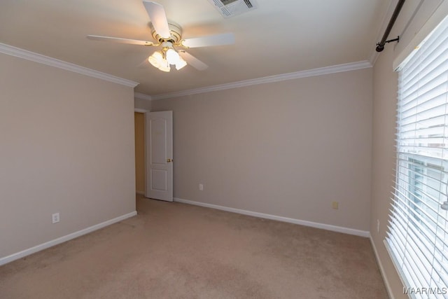 unfurnished room with baseboards, light carpet, visible vents, and crown molding