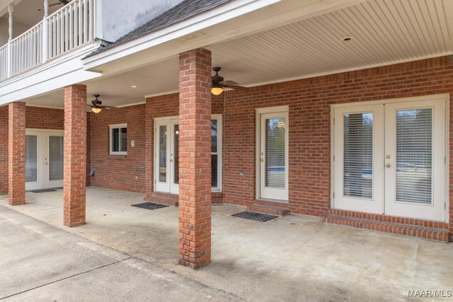 view of patio featuring french doors, a balcony, and a ceiling fan