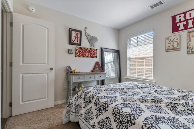 bedroom with carpet and visible vents