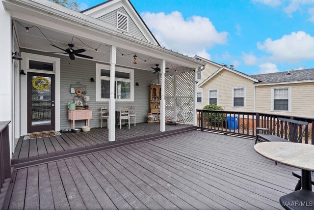 wooden deck with ceiling fan