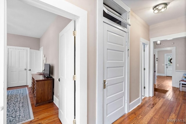 hall with light wood-style flooring