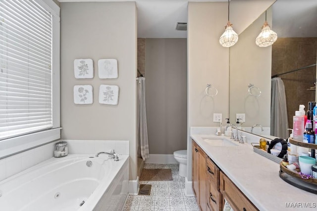 full bathroom with toilet, tile patterned flooring, vanity, a shower with curtain, and a whirlpool tub