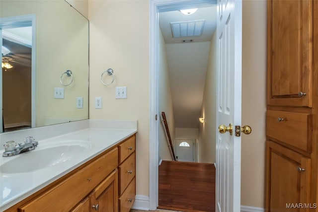 bathroom featuring vanity and visible vents