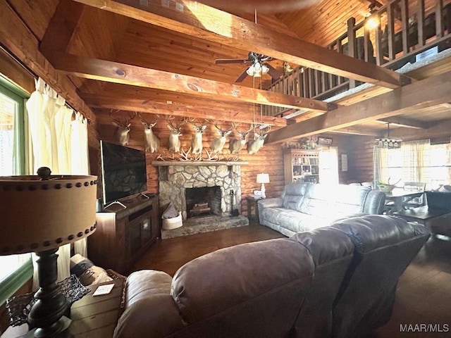 living area featuring beam ceiling, a fireplace, wood finished floors, high vaulted ceiling, and ceiling fan with notable chandelier