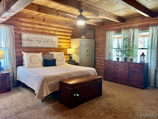 bedroom featuring wooden ceiling, carpet flooring, beam ceiling, and a ceiling fan