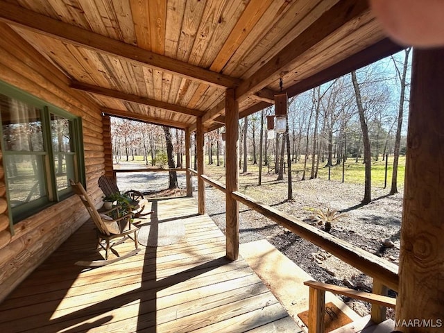 wooden deck featuring covered porch