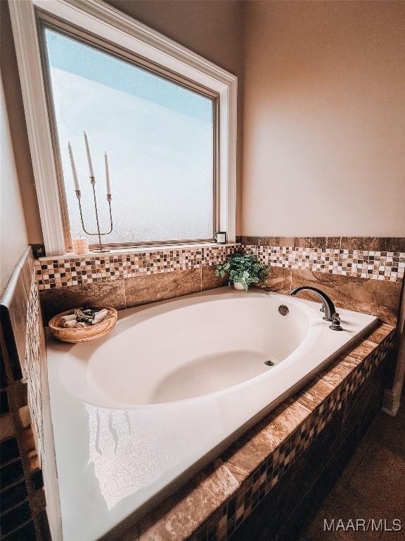 full bathroom featuring a garden tub