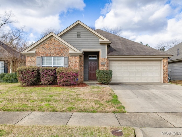 view of front of property featuring a garage, concrete driveway, brick siding, and a front yard