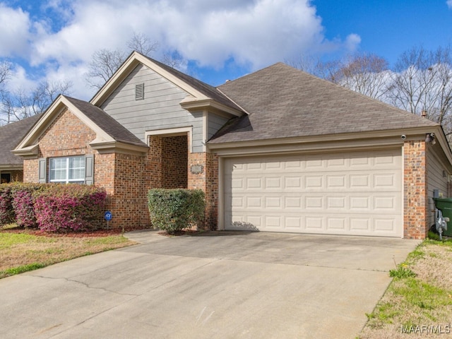 view of front of home with a garage, brick siding, driveway, and roof with shingles