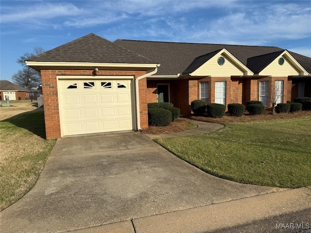 ranch-style home with an attached garage, driveway, a front lawn, and brick siding