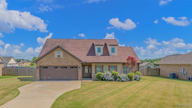 cape cod home featuring driveway, a garage, fence, cooling unit, and a front yard