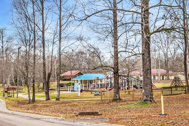 view of community with fence and playground community