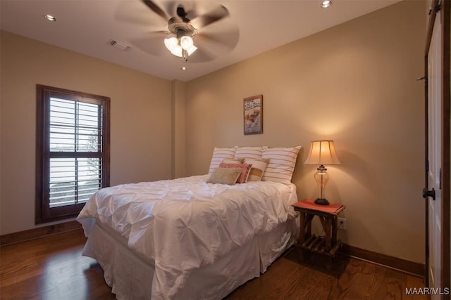 63 Point Cir, Dadeville, AL 36853 - bedroom featuring visible vents, baseboards, and wood finished floors