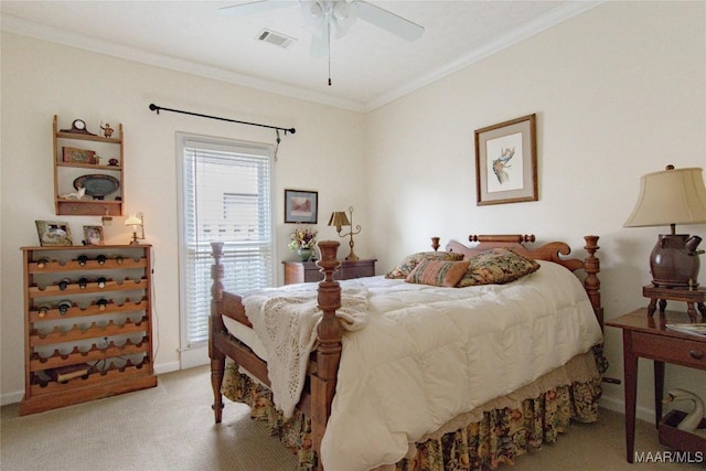 bedroom with light colored carpet, a ceiling fan, baseboards, visible vents, and crown molding