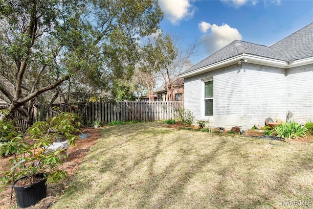 view of yard featuring fence