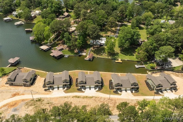 bird's eye view with a residential view and a water view