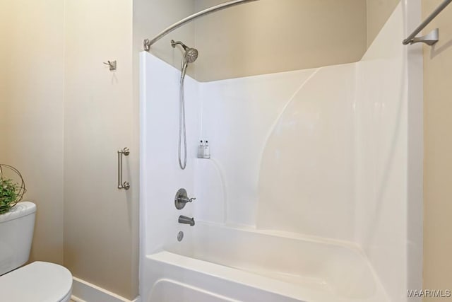 full bath with bathing tub / shower combination and toilet