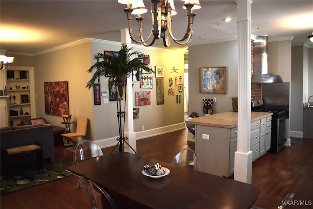 dining room with baseboards, an inviting chandelier, dark wood-type flooring, ornamental molding, and ornate columns