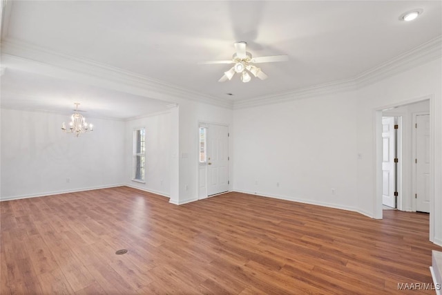 empty room featuring ornamental molding, baseboards, light wood finished floors, and ceiling fan with notable chandelier