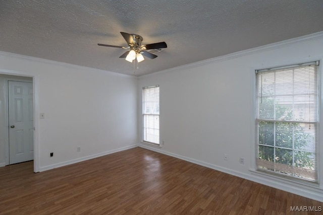 unfurnished room featuring ceiling fan, ornamental molding, and wood finished floors