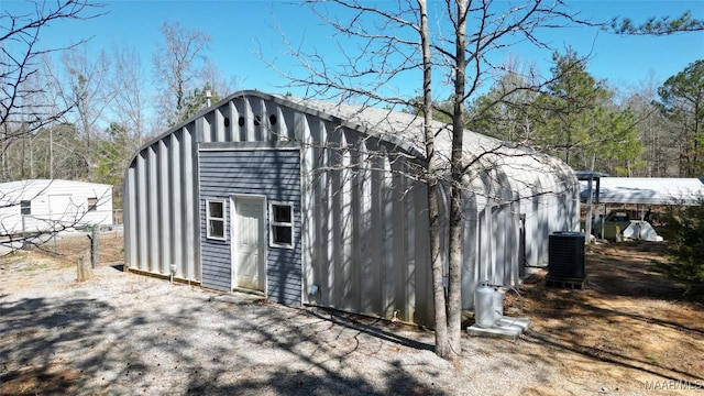 view of outdoor structure featuring an outdoor structure and cooling unit