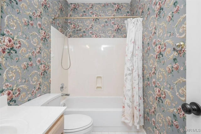 bathroom featuring tile patterned flooring, shower / tub combo with curtain, vanity, and toilet