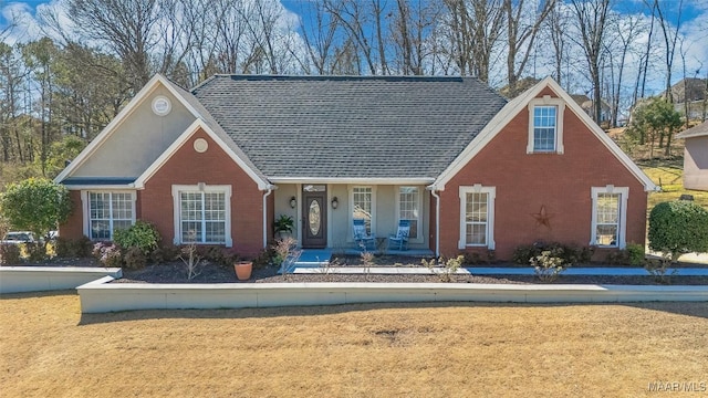 view of front facade featuring brick siding