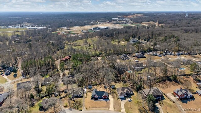 bird's eye view with a forest view