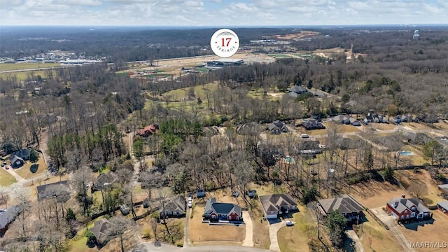 bird's eye view with a forest view