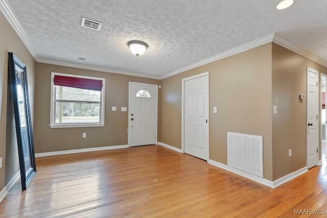 5180 Grace St, Millbrook, AL 36054 - foyer featuring visible vents, baseboards, and light wood-type flooring