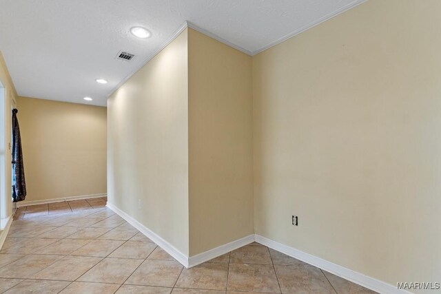5180 Grace St, Millbrook, AL 36054 - hall featuring visible vents, baseboards, recessed lighting, and light tile patterned floors