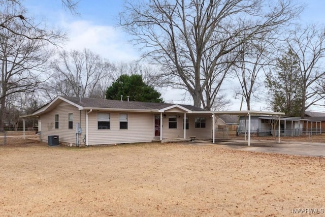 single story home with central AC and fence