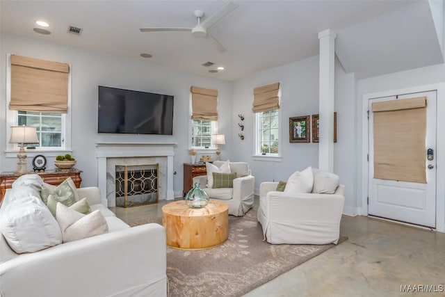 7808 Ebury St, Montgomery, AL 36116 - living area featuring recessed lighting, visible vents, concrete floors, and a fireplace