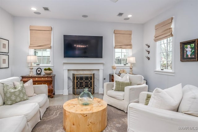 7808 Ebury St, Montgomery, AL 36116 - living area with a high end fireplace, visible vents, and recessed lighting