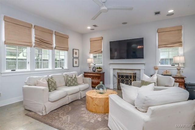 7808 Ebury St, Montgomery, AL 36116 - living room with recessed lighting, visible vents, and a premium fireplace