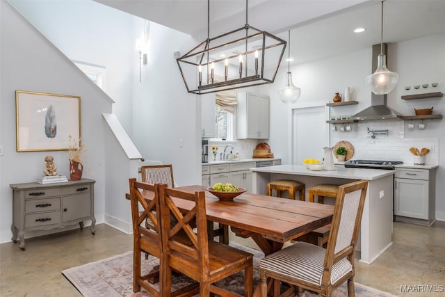 7808 Ebury St, Montgomery, AL 36116 - dining area with finished concrete floors, baseboards, and recessed lighting