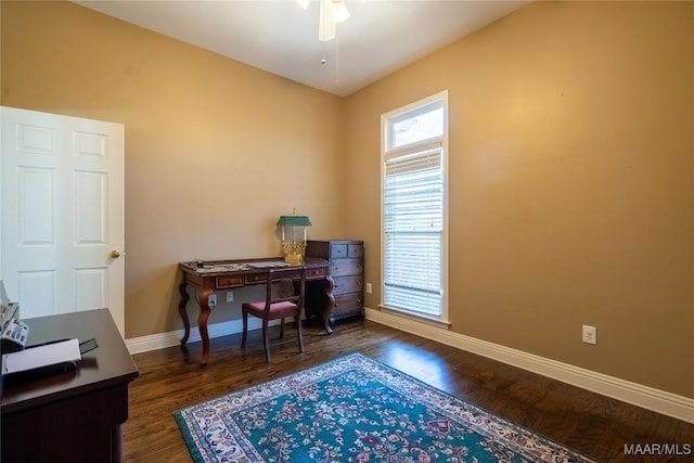 office with wood finished floors, a ceiling fan, and baseboards