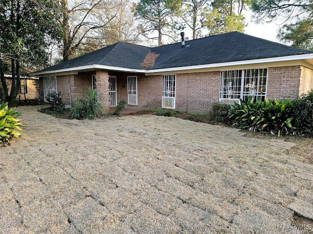 view of front of house with brick siding