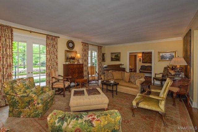 living room featuring french doors and crown molding