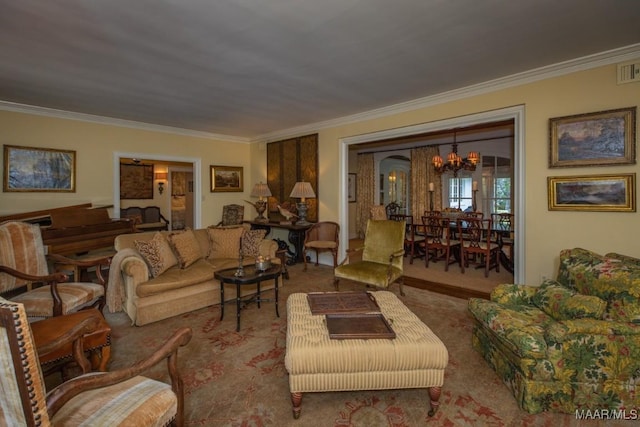 living area with carpet floors, a notable chandelier, and ornamental molding