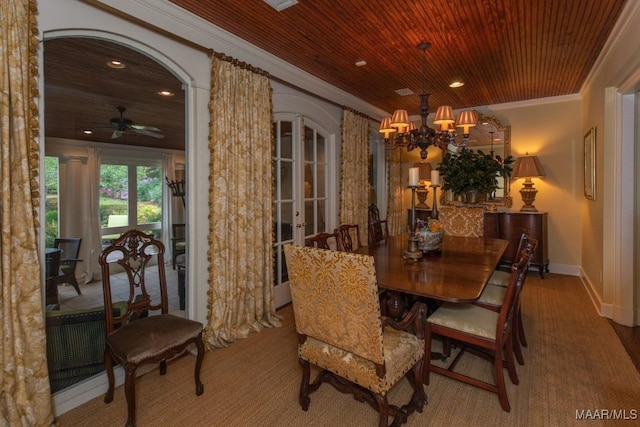 dining room featuring arched walkways, recessed lighting, wood ceiling, french doors, and ornamental molding