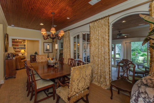 dining area with wooden ceiling, visible vents, and arched walkways