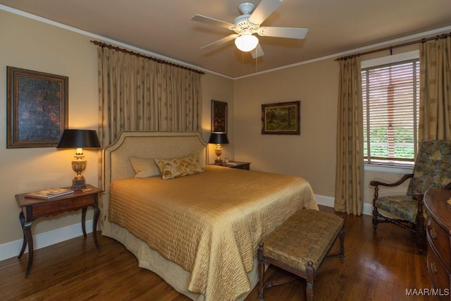 bedroom featuring a ceiling fan, baseboards, crown molding, and wood finished floors