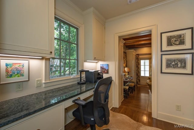 home office with baseboards, dark wood finished floors, built in study area, crown molding, and beam ceiling