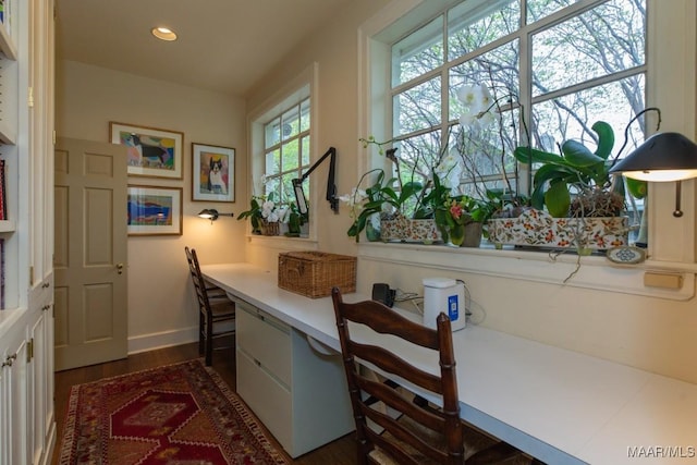 interior space with dark wood-type flooring, recessed lighting, and baseboards