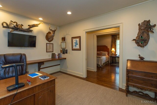 office space with baseboards, wood finished floors, and recessed lighting