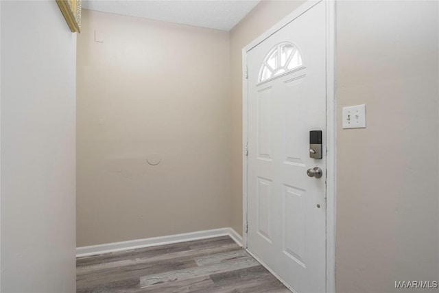 5217 W Shades Valley Dr, Montgomery, AL 36108 - entryway with baseboards and wood finished floors