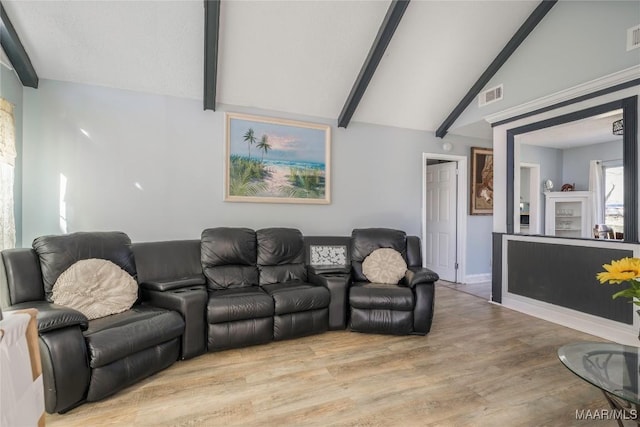 5217 W Shades Valley Dr, Montgomery, AL 36108 - living area with lofted ceiling with beams, light wood-type flooring, and visible vents